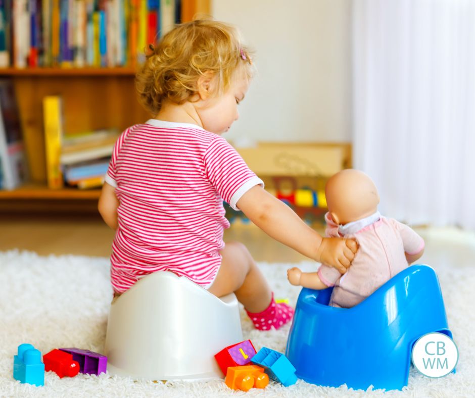 Child sitting on the potty