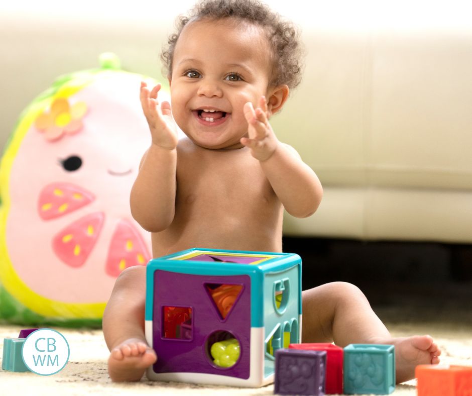 Baby playing with toys alone