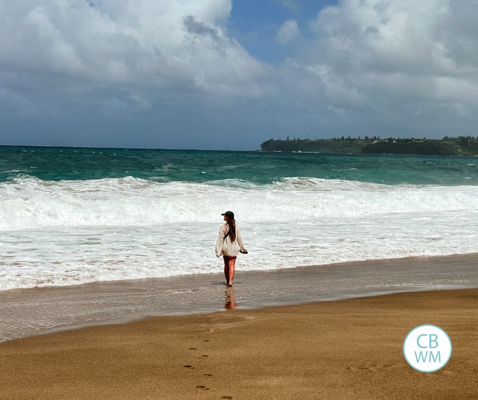 Kaitlyn walking by the ocean on the beach