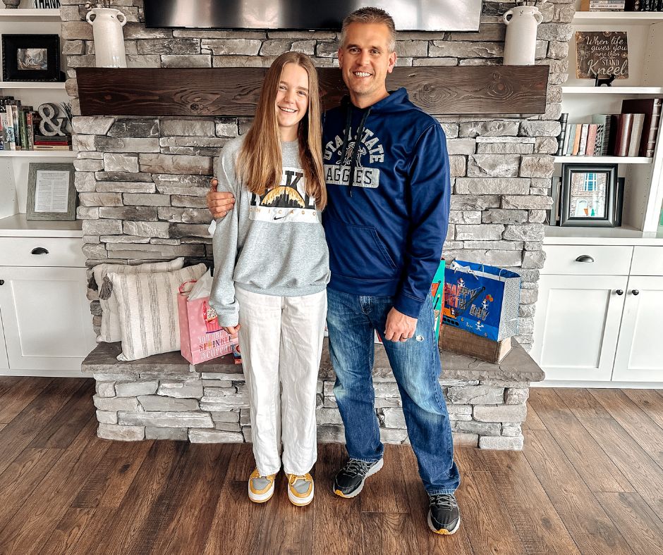 McKenna on her 15th birthday standing next to her dad