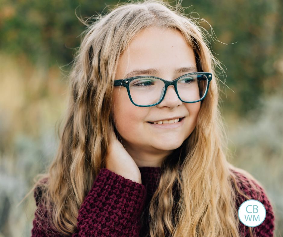 Brinley as a preteen looking off to the side