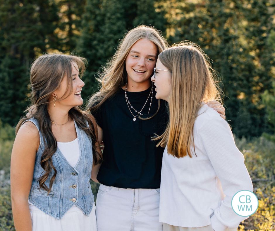 3 girls of tween and teen age talking