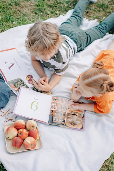 Preschoolers looking at math books