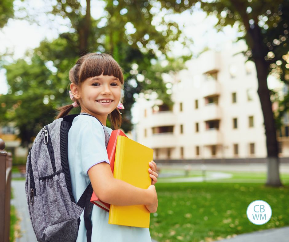 Girl with a backpack going back to school