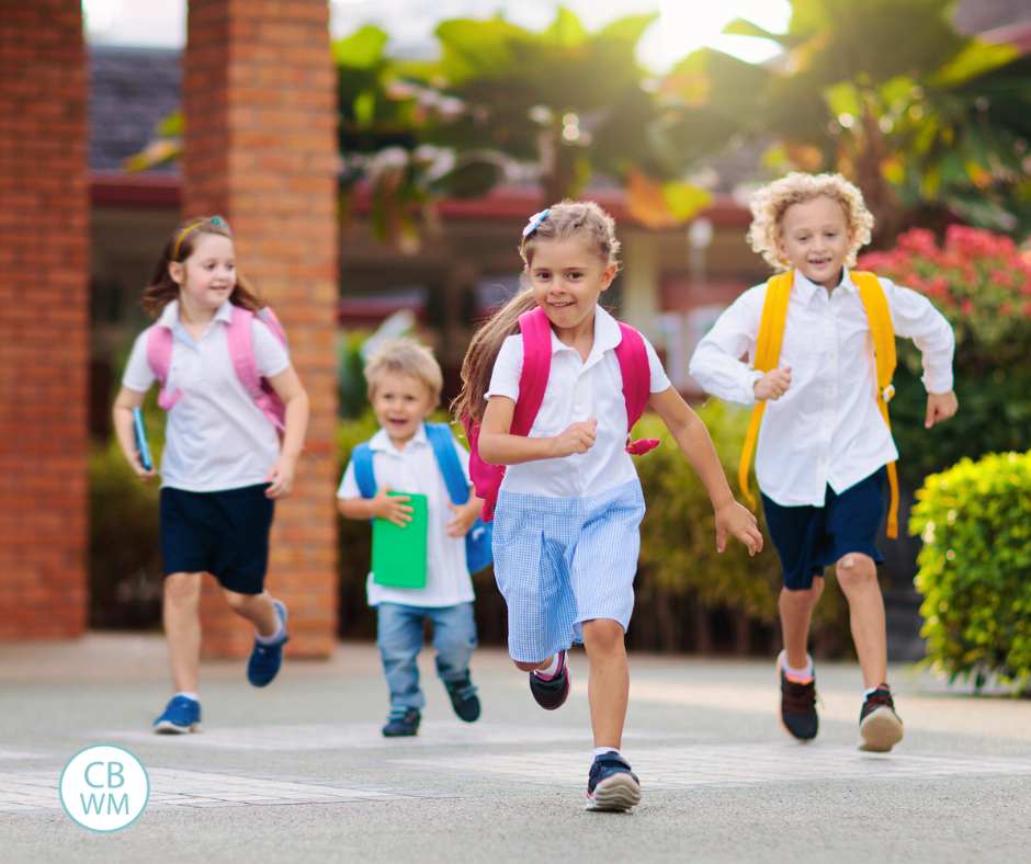Kids running out of the school after school is over