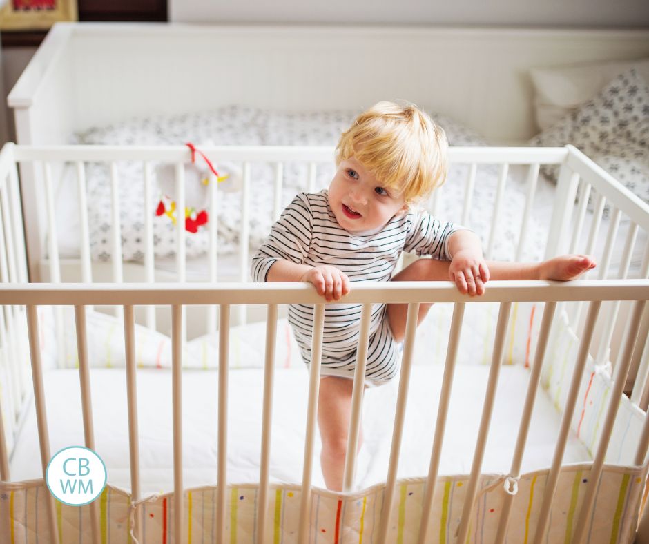 Toddler climbing out of the crib