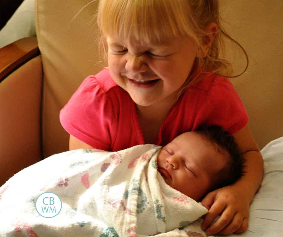 McKenna holding Brinley in the hospital