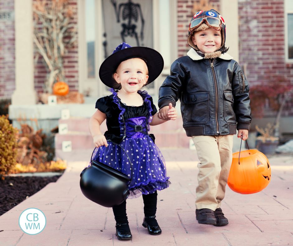 Brother and sister trick-or-treating