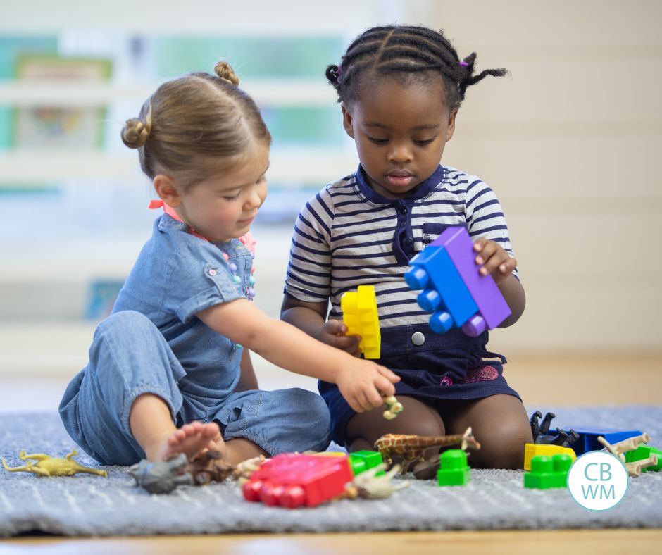 Pretoddlers playing next to each other